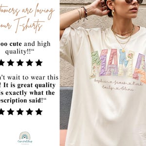 May include: Cream-colored t-shirt with the word "MAMA" in colorful patchwork letters. Below the word "MAMA" are the names Sophia, James, Noah, Emily, and Olivia. The shirt has a relaxed fit and is being worn.