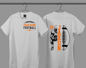 May include: White t-shirts with football-themed designs. One shirt features "TEAM NAME FOOTBALL" in orange and black. The other displays a football player graphic with the name "JAXON" and the number "25".