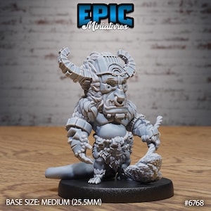 May include: A gray unpainted resin miniature figure of a horned creature with a nose ring, wearing a mask-adorned loincloth and holding a large rock-like weapon. The figure stands on a black circular base with text reading BASE SIZE: MEDIUM (25.5MM).