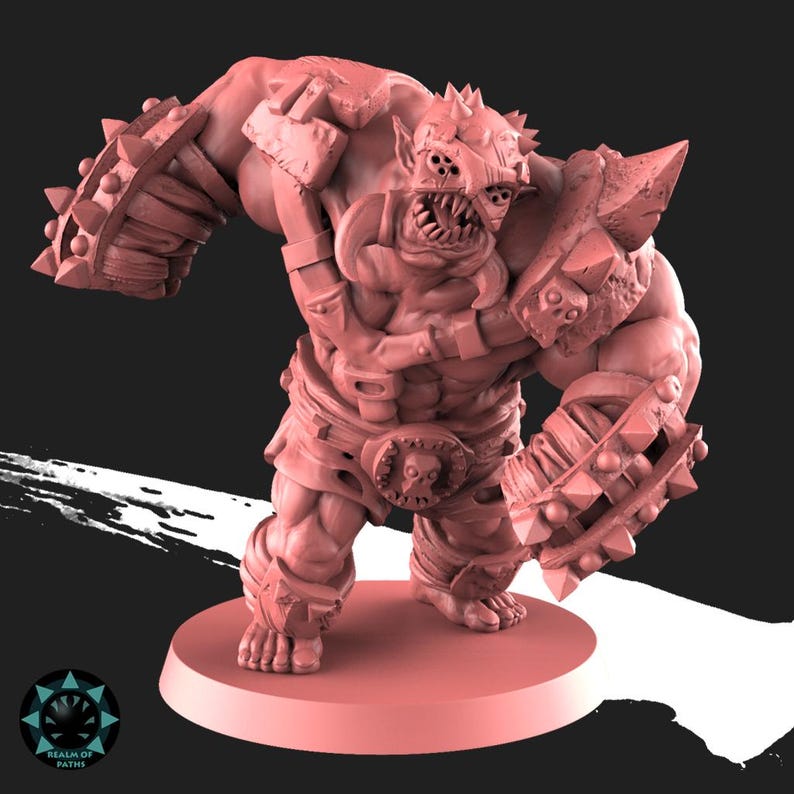 Peut inclure: Figurine miniature rose repr&eacute;sentant une cr&eacute;ature monstrueuse muscl&eacute;e, avec une armure &agrave; pointes. La figurine a une ceinture avec une boucle en forme de cr&acirc;ne, plusieurs yeux et des dents ac&eacute;r&eacute;es. Elle se tient sur une base circulaire.