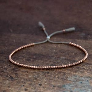 Solid 14k Rose Gold Beaded Friendship Bracelet, delicate bracelet with dainty beads with silk image 1