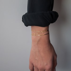 Delicate rose gold and silk beaded bracelet