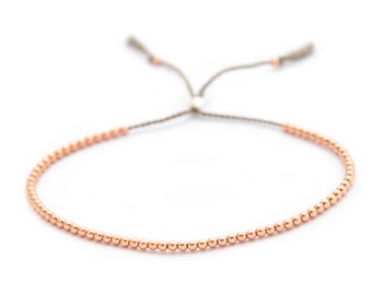 Solid 14k rose Gold Beaded Friendship Bracelet, delicate bracelet with dainty beads with silk