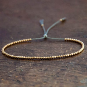 Solid 10k Yellow Gold Beaded Friendship Bracelet, delicate bracelet with dainty beads with silk