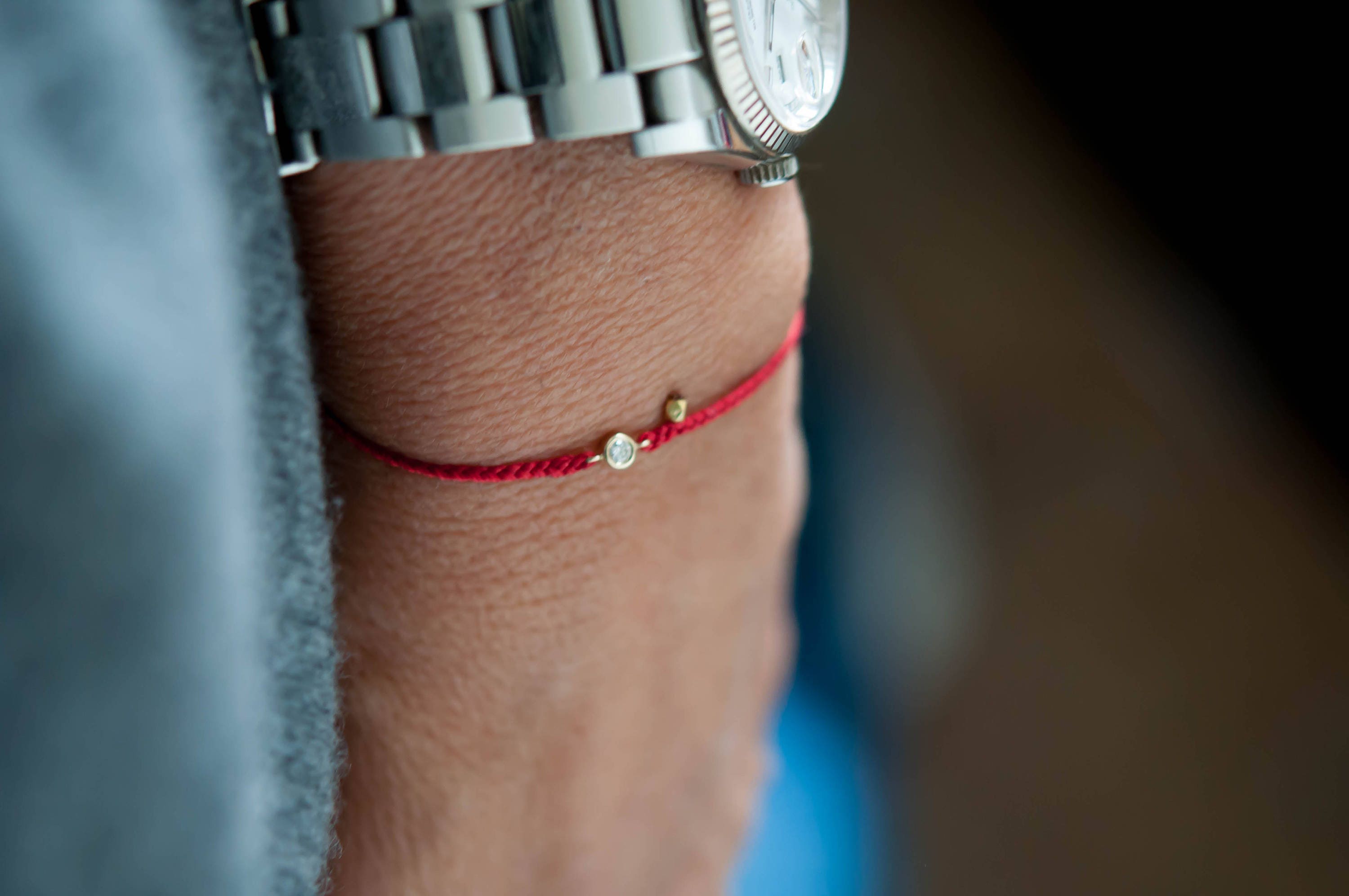 Braided Red Thread Bracelet On Wrist Stock Photo 1100249045