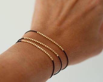 Silk bracelet. Disco faceted friendship bracelet in 14k solid yellow gold.  Beaded bracelet. Delicate bracelet.