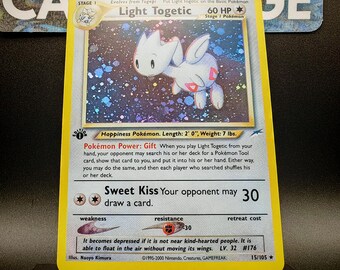 light togetic pokemon card value - 137/214 - Unbroken Bond - Fairy - Rare (You must still do anything else in order to use that attack.) (No matter what type the Defending Pokemon is Pokemon Neo Genesis Holo Rare