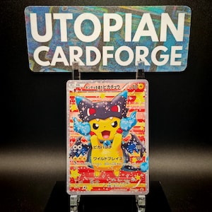 May include: A Pokémon trading card featuring Pikachu wearing a dark blue and black costume with blue accents. The card has Japanese text and the text "UTOPIAN CARDFORGE" above it.