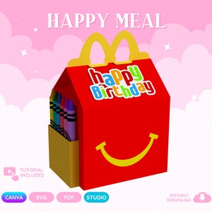 May include: A red cardboard box with a yellow handle and a yellow smiling mouth graphic. The box features a colorful Happy Birthday sticker and a side pocket containing several crayons. The text HAPPY MEAL is displayed at the top of the image.