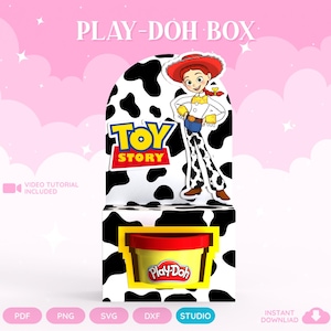 May include: A Play-Doh box template featuring a cow print pattern, the Toy Story logo, and an illustration of Jessie the cowgirl. The box includes a cutout window for a yellow Play-Doh container with a red lid. Text reads PLAY-DOH BOX.