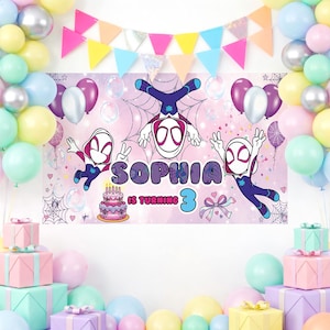 May include: A birthday banner with the name "Sophia" and the phrase "is turning 3" in purple. The banner features Spider-Gwen characters, a cake, and decorative elements. Pastel-colored balloons and gift boxes surround the banner.