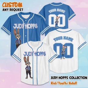 May include: A collection of baseball jerseys featuring Judy Hopps graphics. The blue and white jerseys display the text JUDY HOPPS on the front, with customizable name and number fields on the back. The shirts have button-down fronts and striped sleeves.