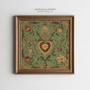 May include: Square framed vintage art print with a gold border. The artwork features a green background with floral and leaf patterns. A heart with a flower is at the center, with a cross and swords. The text "ARTEAWALLPRINTS Printable Vintage Art" is at the top.