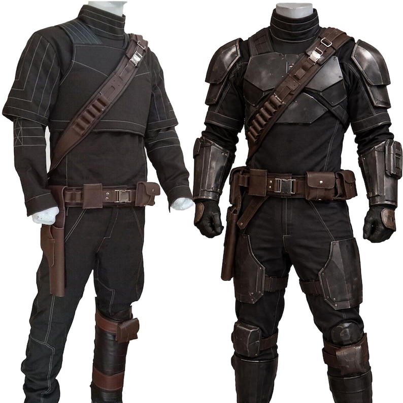 May include: Two black tactical outfits displayed on mannequins. The outfits feature black tops and pants, with brown belts, holsters, and shoulder straps. One outfit has shoulder armor and arm guards. The other has a more streamlined design.