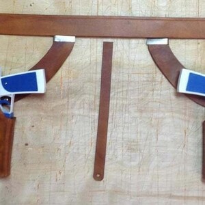 May include: A set of three ceramic mugs with a speckled, matte finish in cream, light grey, and dark grey. Each mug has a minimalist design, ideal for tea or coffee.