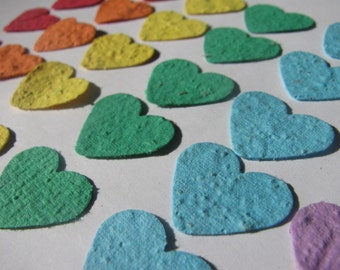 60 Rainbow colored plantable heart confetti- homemade paper embedded with flower seeds