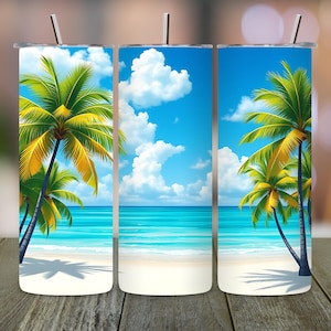 May include: Three stainless steel tumblers with a beach scene design. The tumblers feature a blue sky with white clouds, a turquoise ocean, and white sand. Palm trees with green leaves and yellow trunks are in the foreground.