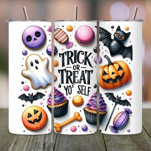 May include: White tumbler featuring a Halloween design with a ghost, bat, pumpkin, cupcakes, and sweets. The text "Trick or Treat Yo' Self" is in the centre. The tumbler has a silver straw.
