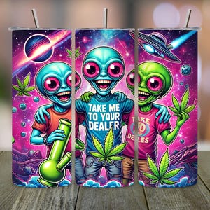 May include: Three cartoon aliens in a space-themed design with a pink, purple, and blue background. The aliens are wearing shirts with marijuana leaf designs and the text "Take me to your dealer".