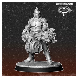 May include: A gray miniature figure of a warrior in armor, holding a large weapon. The figure has a mohawk hairstyle and a stern expression. The base is black, and the background is a textured dark gray. The text "VERMILION MINIATURES" is visible.