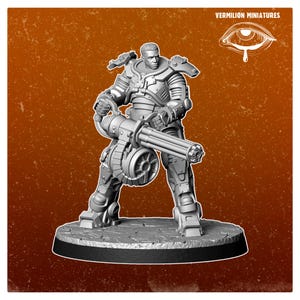 May include: A gray miniature figure of a person in futuristic armor, holding a large machine gun. The figure stands on a circular base. The text "VERMILION MINIATURES" and an eye logo are in the upper right corner.