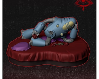 May include: A blue and gold robot figure reclines on a red cushion, surrounded by red roses and a purple pillow. The robot has a mechanical design with a tube-like neck and is positioned in a relaxed pose. The image includes the text "VERMILION MINIATURES".