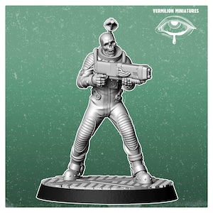 May include: A gray miniature figure of a skeleton wearing a ribbed space suit and holding a large rectangular blaster rifle. The figure stands on a circular base with a textured grate pattern. The text Vermilion Miniatures appears above an eye icon.