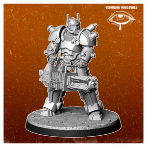 May include: A gray miniature figure of a futuristic soldier, holding a large weapon. The figure is highly detailed, with armor plating and mechanical components. The miniature is standing on a textured base. The text "VERMILION MINIATURES" is visible.