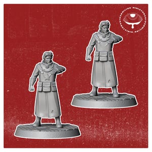 May include: Two gray painted miniature figures of soldiers wearing hats and long coats. The figures are standing on round bases.