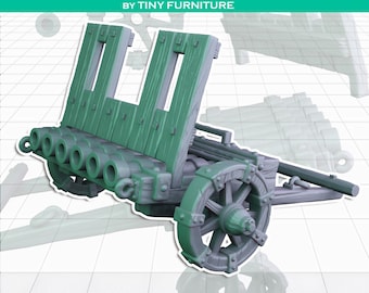 May include: A miniature green and gray model of a ribauldequin, a medieval multi-barreled cannon. The model features a wooden frame, wheels, and multiple gun barrels. The text "RIBAULDEQUIN BY TINY FURNITURE" is at the top.