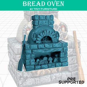 May include: A teal-colored miniature bread oven made of brick-like material. The oven has a rounded top and a rectangular base with a space for logs. The text "BREAD OVEN BY TINY FURNITURE" is at the top. A long, flat tool and a broom are next to the oven.