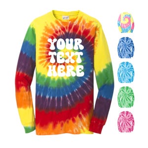 May include: A long-sleeved tie-dye shirt with a rainbow swirl pattern. The shirt has the text "YOUR TEXT HERE" in white, retro-style lettering.