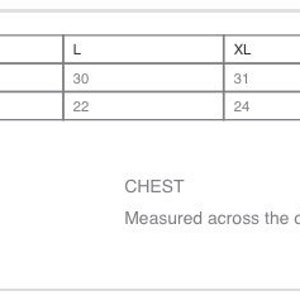 May include: Size chart for clothing with measurements in inches for body length at back and chest. Sizes include XS, S, M, L, XL, 2XL, 3XL, and 4XL.