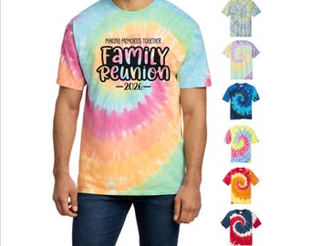 May include: Tie-dye t-shirts in various colors, including blue, pink, orange, and yellow. The shirts feature the text "MAKING MEMORIES TOGETHER FAMILY REUNION -2026-". Several shirt color options are displayed.