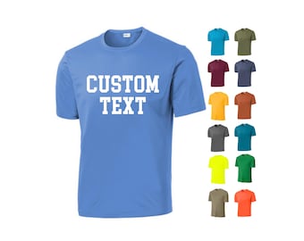 May include: A light blue t-shirt with the text "CUSTOM TEXT" printed in white on the front. The shirt is shown in a variety of colors, including red, green, yellow, and orange.