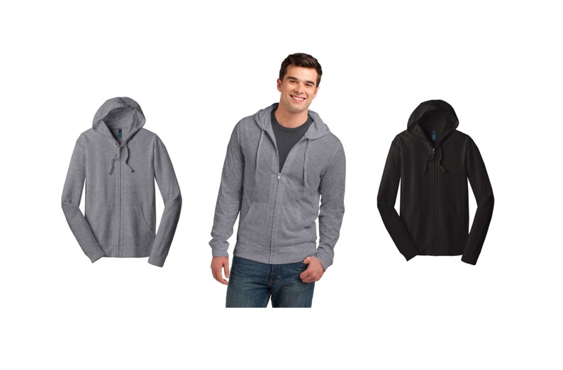 May include: Three hooded sweatshirts, one in heather gray, one in black, and one being worn by a person. The sweatshirts have a zipper closure and a drawstring hood.