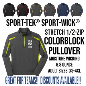 May include: A gray, black, and neon green colorblock pullover with a 1/2 zip. The pullover is moisture wicking and weighs 6.8 ounces. The text "SPORT-TEK® SPORT-WICK®" and "YOUR TEXT HERE" is printed on the pullover.  "STRETCH 1/2-ZIP COLORBLOCK PULLOVER" is printed in black text.  "MOISTURE WICKING 6.8 OUNCE ADULT SIZES XS-4XL" is printed in black text.  "GREAT FOR TEAMS!! DISCOUNTS AVAILABLE!!" is printed in blue text.