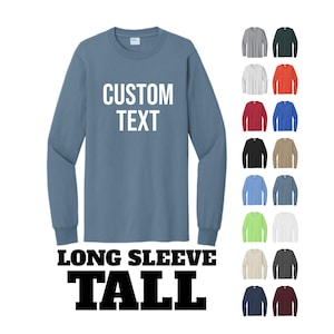 May include: A long-sleeved t-shirt in a light blue color with the text "CUSTOM TEXT" printed in white on the front. The shirt is available in a variety of colors, as shown in the image. The text "LONG SLEEVE TALL" is printed in black below the shirt.