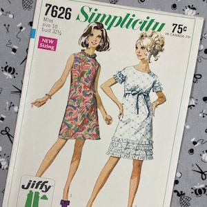 May include: A vintage Simplicity sewing pattern for a dress, pattern number 7626. The pattern is for a sleeveless dress with a ruffled hem and a bow at the waist. The pattern is for a size 10, bust 32 1/2 inches. The pattern is called "Jiffy" and has 2-3 main pattern pieces. The pattern is easy to cut and sew.
