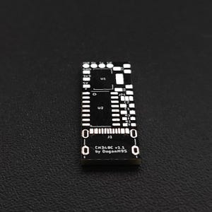 May include: A black circuit board with white text and markings. The text reads "CM340C v2.1 by Dagoodan95".