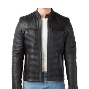 Premium Genuine Leather: Crafted from 100% high-quality, durable real leather for lasting wear.
 * New Style & Design: Modern slim fit with unique textured front panels for a standout look.
 * Versatile Biker Jacket: Perfect for casual wear, motorcycle enthusiasts, or a stylish night out.
 * Functional & Fashionable: Features multiple zippered pockets and a sleek stand collar.
 * Investment Piece: Built for lifetime durability, offering exceptional value and style.