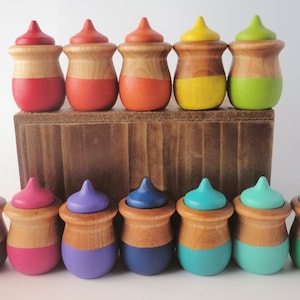 Loose parts play, color matching acorn pots