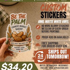 May include: A custom sticker featuring a bakery illustration with bread, wheat, and flowers, labelled Be The Palm Farmer's Market Bakery. The sticker includes text stating Baked Fresh, Made With Love, Support Local, and Thank You on a white vinyl base.