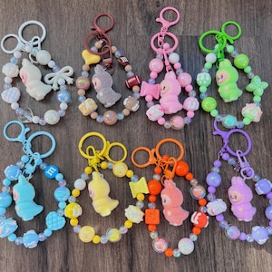 Labubu Key Charms, Labubu keychains, labubu bag charms with beaded Straps, Kawaii bag charms, Multicolor mini labubu figurine charm keychain