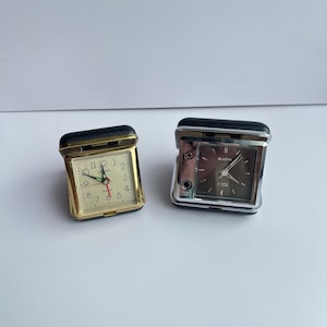 Pick One - 2 old school travel clocks