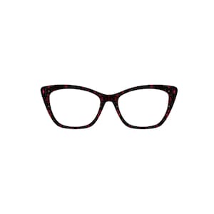 May include: Black cat-eye glasses with a red and black patterned frame.