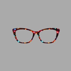 May include: Cat-eye style eyeglasses with a festive design. The frames are decorated with a pattern of colorful lights, including red, blue, and yellow. The glasses have a dark background, creating a striking contrast with the bright lights.