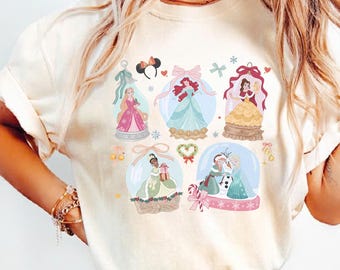 Coquette Bow Disney Princess Christmas Shirt, Mickey's Very Merry Christmas Party, Frozen Elsa Anna Olaf Belle Rapunzel Disney Girl Trip Tee
