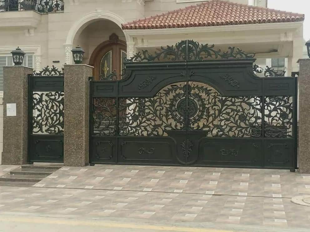 Handmade cast iron estate driveway gate with ornamental floral panels, Lahore Pakistan
