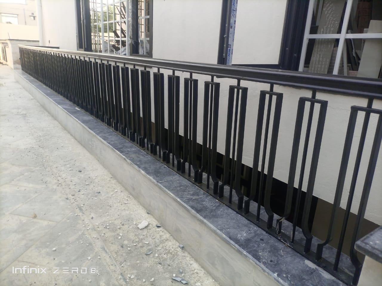 Handmade modern vertical bar terrace railing with matte black finish